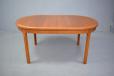 Vintage oval top teak dining table extending with 2 extra leaves