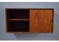 Sliding door storage cabinet for CADO System by Poul Cadovius in rosewood.