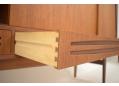 Dove-tailed jointed drawers on 4 sliding door teak sideboard.