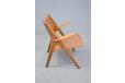 Hans Wegner CH28 armchair in oak and brown leather for sale