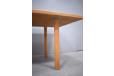 Tubular solid oak legs on Hans Wegner lounge table