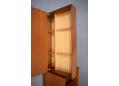 Flip top deak built into the vintage teak shelving 