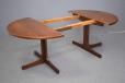 Vintage rosewood dining table with round top for sale