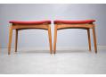 Midcentury danish design foot stools with original red fabric upholstery.