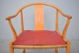 Beech frame with impressive patina and recent red leather seat pad.