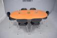 The table comfortably seats 6 of the ANT chairs by Arne Jacobsen.