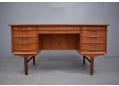 Danish midcentury desk in teak with 9 drawers.