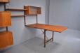 Vintage Danish wall mounted shelving unit in teak, designed by Poul Cadovius 1947