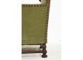 Strong framed 1940s design high back chair in green fabric upholstery.