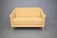 Modern Danish design 2 seater sofa with beige alcantara upholstery