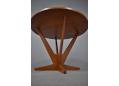 Sturdy V shaped legs supporting the round top