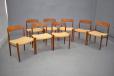 Set of 8 teak and papercord dining chairs by Niels Moller
