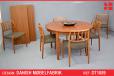 Vintage circular dining table in teak on triangular legs - view 1