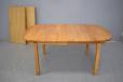 Solid oak dining table extending with 2 extra leaves for sale