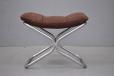 Chromed steel tube framed foot stool with original leather upholsterd cushion