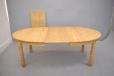 Large oak dining table with oval top produced by Danish Cabinetmaker