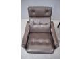 Vintage reclining armchair with laminated wood frame in dark finish.