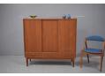 1950s Danish design teak highboard on oak legs with 6 drawers. SOLD