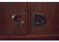 Round handles made by Brdr Boisen on rosewood 3 door wall unit.