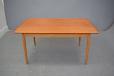 Dining table in contrsting teak and oak designed by Arne Vodder for Sibast Furniture
