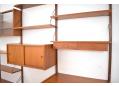 3 bay PS system in teak with 10 shelves & 3 cabinets.