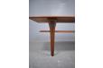 Rectangular shaped teak coffee table with Y shaped legs & magazine shelf. 