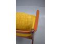 The original yellow boucle upholstery is in perfect condition and vibrant as when it was new.