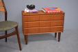 Chest of drawers in vintage teak on cylindrical, tapering legs