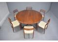 Paired here with 8 Erling Torvits rosewood dining chairs.