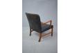 Black leather armchair with vintage roswood frame designed by Ole Wanscher