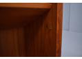 Narrow teak bookcase ideal for alcoves or smaller rooms.