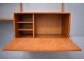 The drop front cabinet can be used to store a multitude of items. 