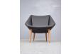 Midcentury modern design angular easy chair in black leather