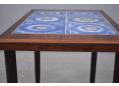 Carved into the sides of the table are finger grips making it easy to lift & move the table