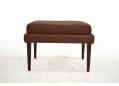 Vintage brown leather footstool with rosewood legs. SOLD