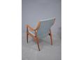 Danish design armchair with teak frame and laminated wood armrest. France & Daverkosen