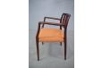 Vintage rosewood armchair with restored frame and no upholstery