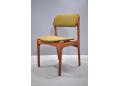 Oddense produced Erik Buch dining chair with green fabric seat.