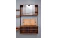 Midcentury design 3 bay rosewood fm system featuring 4 cabinets, a singular shelf and light box 