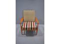 Reclining back armchair with original striped fabric upholstery. France & Daverkosen 1951.