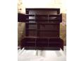 Tall rosewood wall unit with lots of storage space.