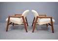 Beautiful patina teak arms offer support & a comfortable seating experience. 
