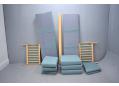 Compact 3 seat box frame sofa in light blue fabric with beech frame ends. 