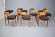 Warm toned cherry wood frame with wide large curved back offering maximum comfort