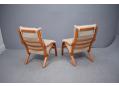 High back modern armchair made in Denmark with laminated beech frame.