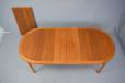 Extending oval top dining table in vintage teak produced by Gudme Mobelfabrik