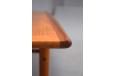 Coffee table with raised sides and magazine shelf between the legs - Glostrup Mobelfabrik