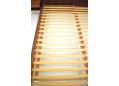 Roll-up beech slats for mattress support are 10 inch off the floor.