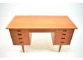 9 drawer desk made in Denmark in teak.