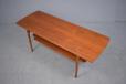 Solid teak Danish design coffee table on tapering legs